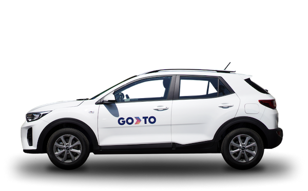 GoTo passenger or family car, a white compact SUV with GoTo branding on the side.